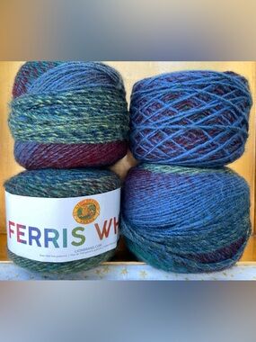 4 Cakes Ferris Wheel Lion Brand Yarn. “Imaginary Garden” color. Worsted Wt.